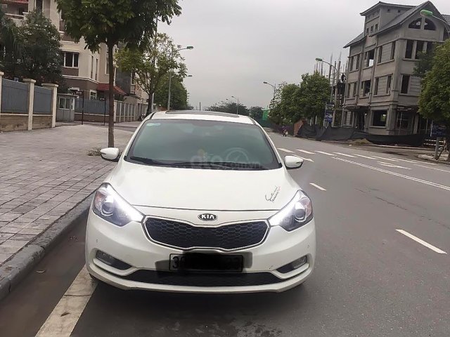 Bán Kia Cerato 1.6 AT 2014, màu trắng, xe chất lượng tốt0