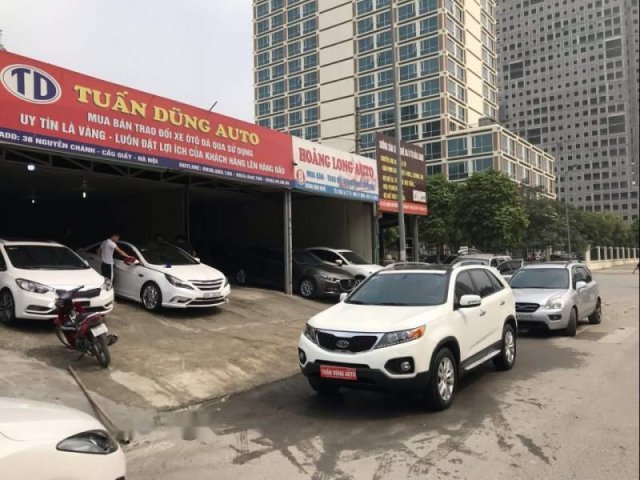 Cần bán xe Kia Sorento đời 2013, màu trắng như mới0