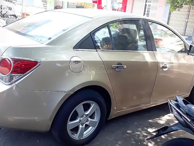 Bán ô tô Chevrolet Cruze năm 2010, màu vàng, xe bao đẹp