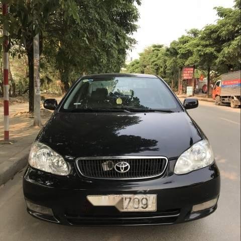 Cần bán Toyota Corolla altis 1.8G đời 2003, màu đen, giá 230tr