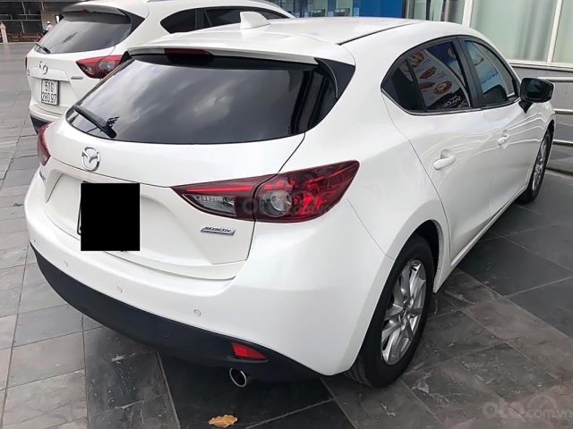 Bán Mazda 3 1.5G đời 2015, màu trắng xe gia đình