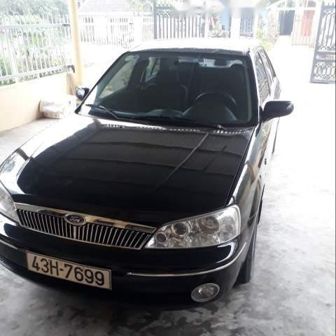 Bán Ford Laser đời 2003, màu đen còn mới, giá tốt0