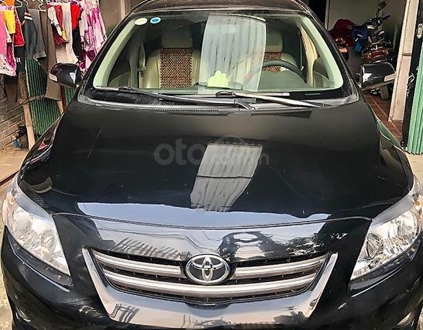 Bán xe Toyota Corolla Altis 1.8G sx 2009, số tay, máy xăng, màu đen, nội thất màu kem, đã đi 154000 km0