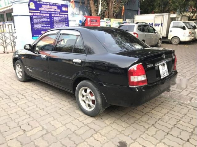 Cần bán Mazda 323 năm sản xuất 2004, màu đen, nhập khẩu nguyên chiếc, giá cạnh tranh