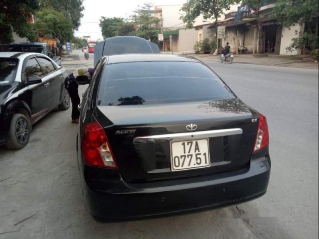 Cần bán lại xe Chevrolet Lacetti đời 2009, màu đen0