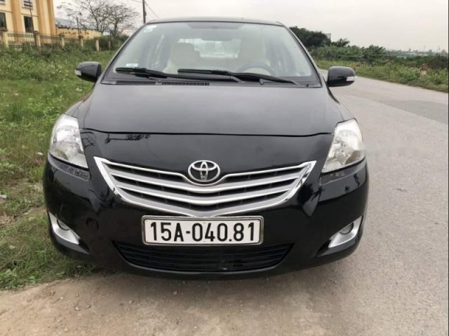 Bán xe Toyota Vios 1.5E 2012, màu đen chính chủ