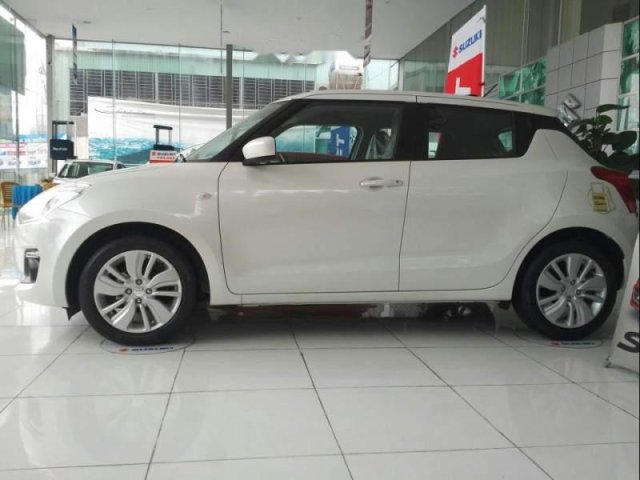 Cần bán Suzuki Swift đời 2019, màu trắng, nhập khẩu nguyên chiếc, mới 100%