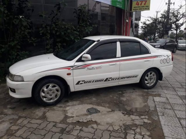 Bán xe Mitsubishi Lancer đời 2002, đang đi làm