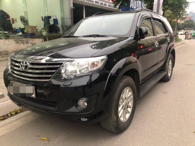 Bán Toyota Fortuner đời 2013 màu đen, giá 690 triệu