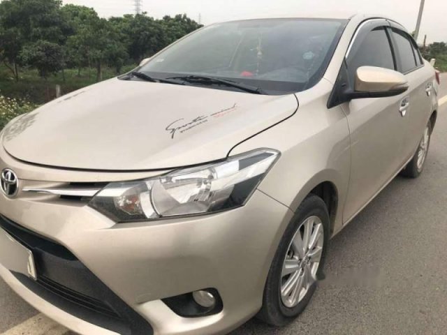 Bán Toyota Vios E sản xuất năm 2016, màu vàng0