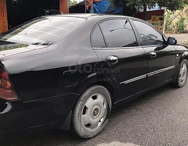 Cần bán Daewoo Magnus 2003, màu đen, nhập khẩu 