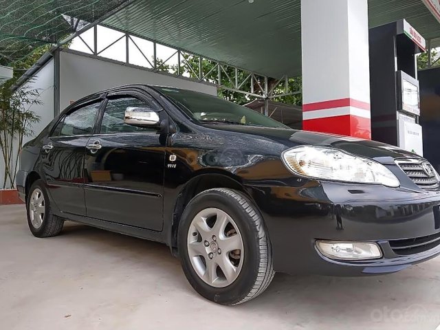 Bán xe Toyota Corolla altis 1.8G đời 2004, màu đen, nhập khẩu, xe gia đình, giá tốt