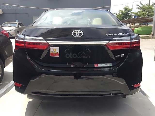 Cần bán Toyota Corolla altis 1.8G CVT năm 2019, màu đen 