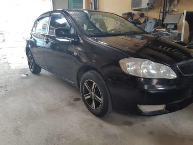 Bán ô tô Toyota Corolla Altis 1.8 MT đời 2002, màu đen xe gia đình0