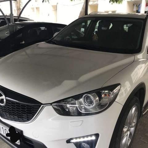 Cần bán lại xe Mazda CX 5 đời 2015, màu trắng xe gia đình0