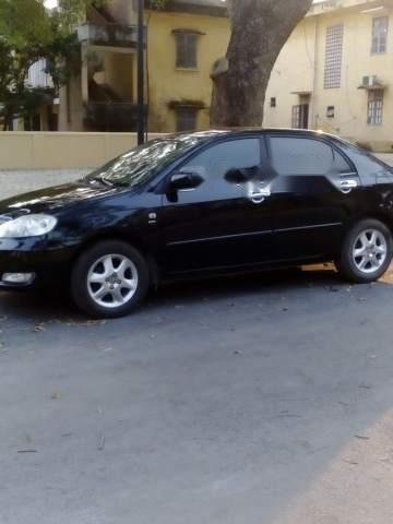 Bán Toyota Corolla altis đời 2004, màu đen xe gia đình0