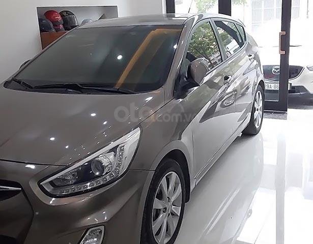 Cần bán Hyundai Accent 1.4 AT sản xuất 2014, màu nâu, xe nhập