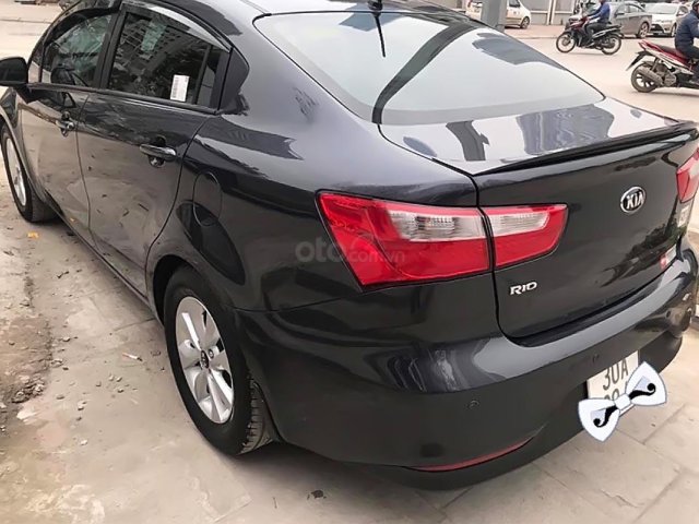 Bán xe Kia Rio 1.4 AT sản xuất năm 2015, màu đen, nhập khẩu  