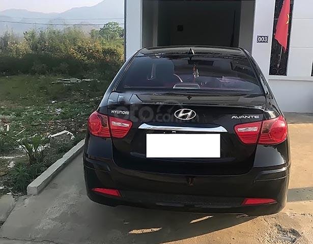 Cần bán lại xe Hyundai Avante 1.6 AT 2012, màu đen