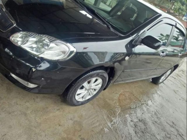 Bán Toyota Corolla altis 1.8MT đời 2004, màu đen0