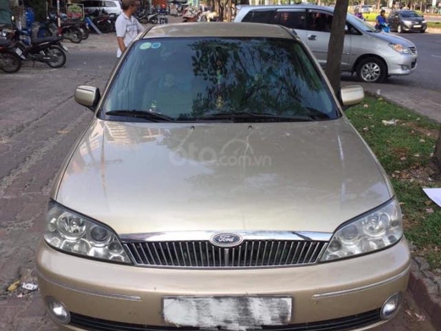 Cần bán xe Ford Laser sản xuất 2003, màu kem (be), 220 triệu