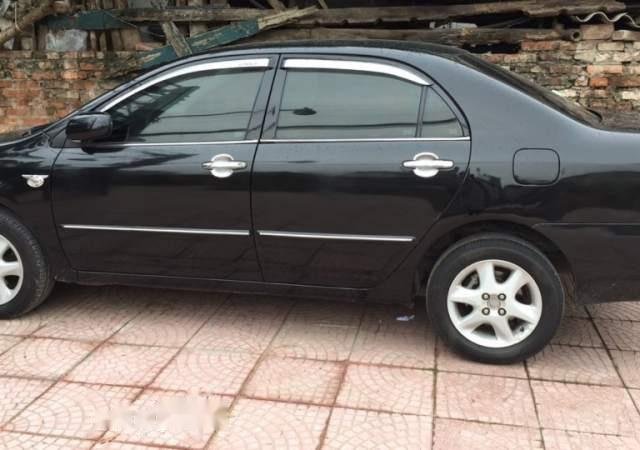 Cần bán xe Toyota Corolla altis năm 2004, màu đen, giá chỉ 255 triệu