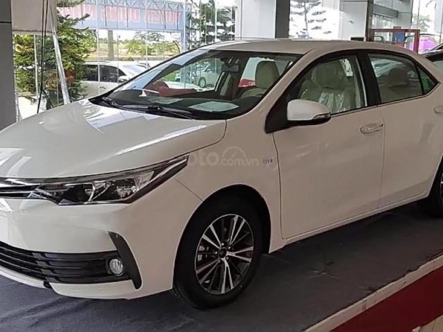 Bán Toyota Altis 1.8G màu trắng mới 100%0