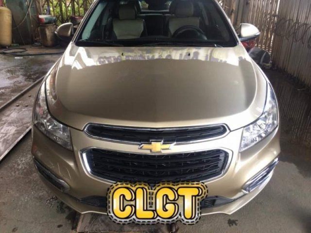 Cần bán xe Chevrolet Cruze đời 2016, màu vàng còn mới