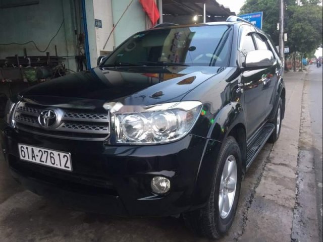 Bán xe Toyota Fortuner sản xuất năm 2011, màu đen xe gia đình, giá 650tr0