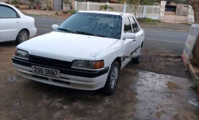 Bán ô tô Mazda 323 đời 1996, màu trắng, xe đang sử dụng hàng ngày0