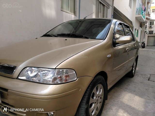 Cần bán Fiat Albea HLX năm sản xuất 2007, màu vàng chính chủ0