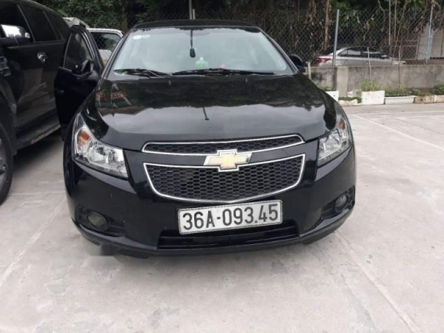 Cần bán Chevrolet Cruze sản xuất 2014, màu đen còn mới0