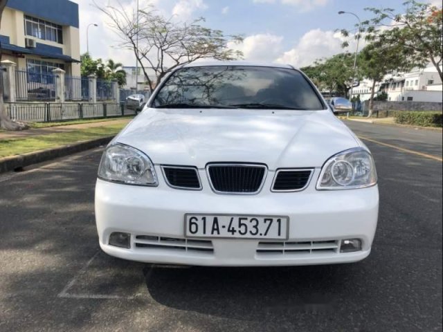 Cần bán lại xe Daewoo Lacetti đời 2004, màu trắng, nhập khẩu, xe cam kết không ngập nước