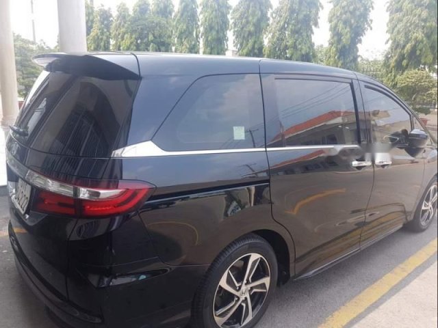 Cần bán lại xe Honda Odyssey sản xuất năm 2016, màu đen