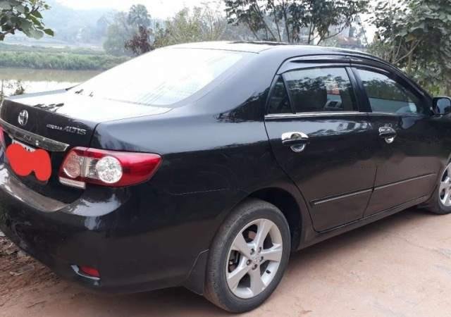 Bán xe Toyota Corolla altis đời 2012, màu đen chính chủ