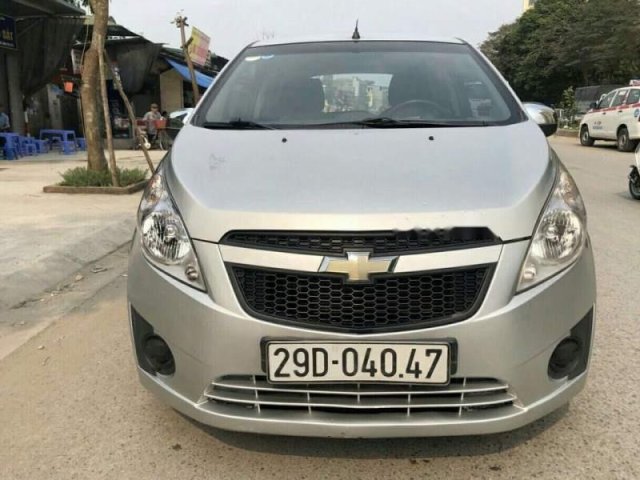 Cần bán xe Chevrolet Spark đời 2011, màu vàng, nhập khẩu nguyên chiếc còn mới