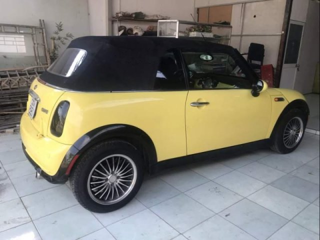 Bán xe Mini Cooper sản xuất năm 2006, màu vàng, nhập khẩu nguyên chiếc0