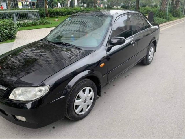 Bán xe Mazda 323 Classic 2003, màu đen, chính chủ