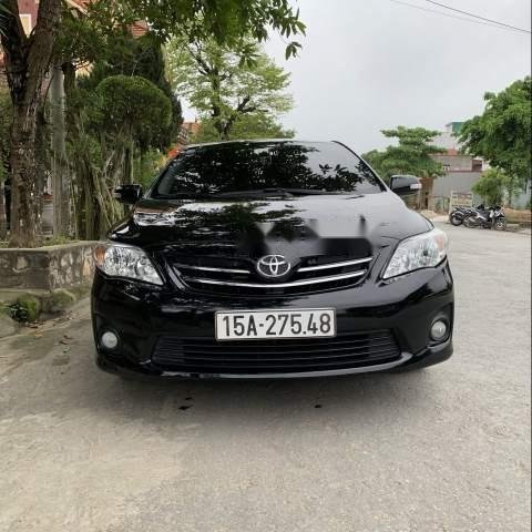 Cần bán gấp Toyota Corolla altis đời 2012, màu đen còn mới