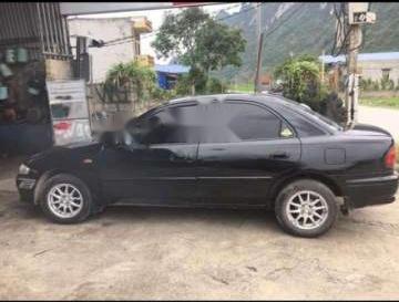 Cần bán Mazda 323 đời 2001, màu đen, xe nhập, 78tr