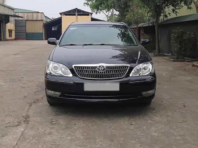 Bán ô tô Toyota Vios 2.4 G năm 2004, màu đen, số sàn