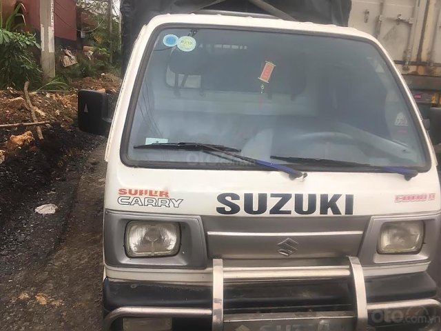 Cần bán xe tải thùng 5 tạ Suzuki Super Carry Sx 2009, số tay, máy dầu, màu bạc, nội thất màu đen0