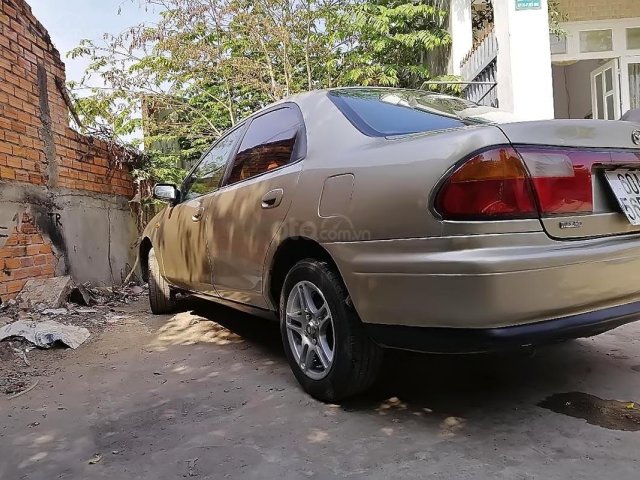 Cần bán gấp Mazda 323 20010