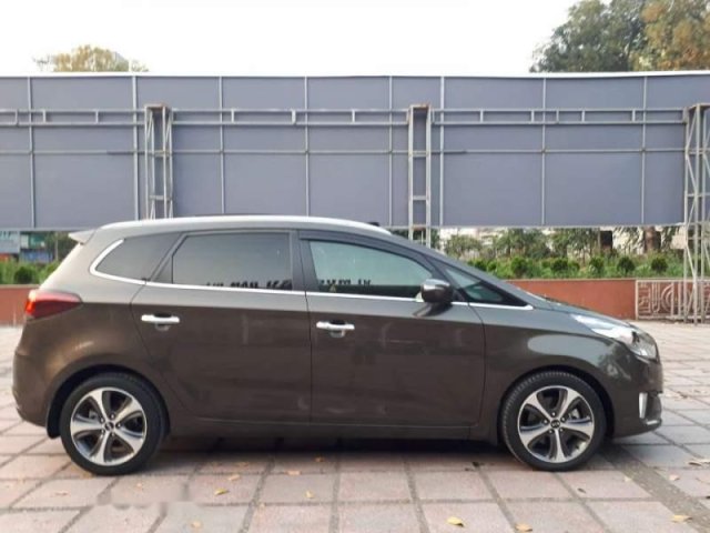 Bán Kia Rondo 2.0 GATH đời 2015, màu nâu chính chủ, 620tr