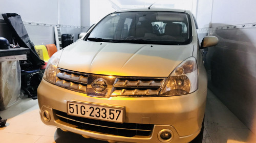 Cần bán xe Nissan Grand livina năm 2011, màu kem (be)0