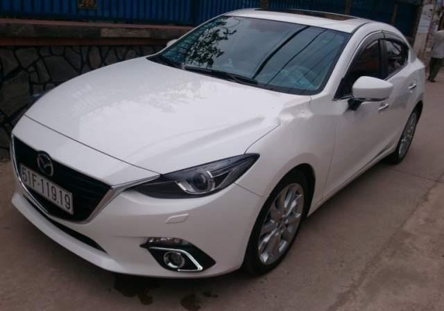 Bán xe Mazda 3 2.0AT năm 2015, màu trắng, 610 triệu