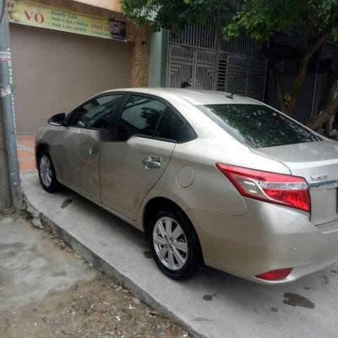 Chính chủ bán Toyota Vios SX 2014, ĐK 2015, màu vàng cát0