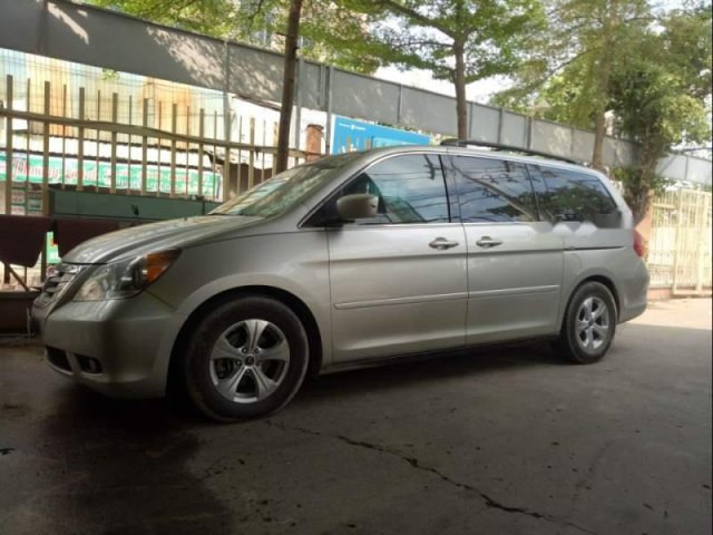 Cần bán xe Honda Odyssey sản xuất 2008, màu vàng, nhập khẩu số tự động0