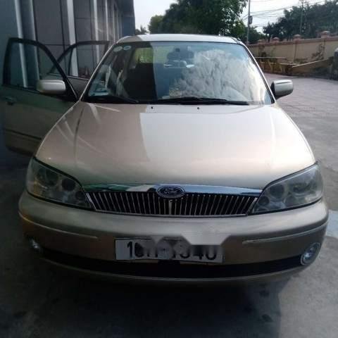 Bán xe Ford Laser năm 2003, màu vàng, giá 205tr0