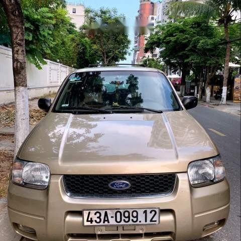 Cần bán lại xe Ford Escape 3.0 V6 năm sản xuất 2002, màu vàng